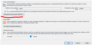 Trados Studio message box showing a recommendation to recompute fuzzy index statistics due to significant growth in translation memory size, with an OK button.