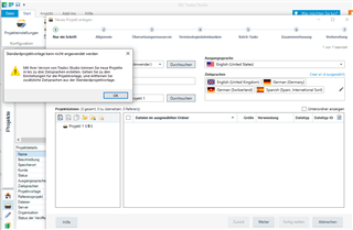 Trados Studio error message in German stating multiple target languages in the default template, with a suggestion to remove languages.