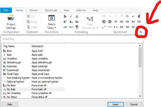 Screenshot of Trados Studio Ideas showing the QuickInsert sub-tab with a red arrow pointing to the bottom right corner icon for removing text formatting.