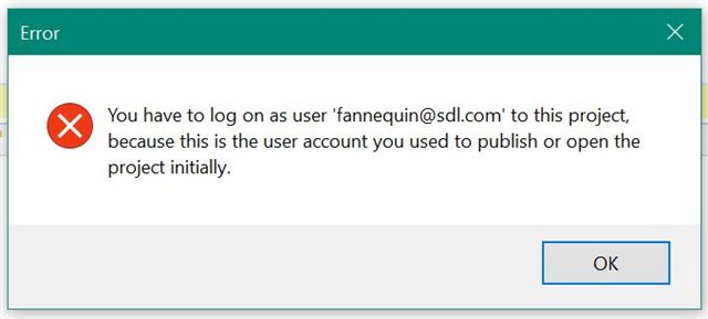 Error message in Trados Studio stating 'You have to log on as user 'fannequin@sdl.com' to this project, because this is the user account you used to publish or open the project initially.' with an OK button.