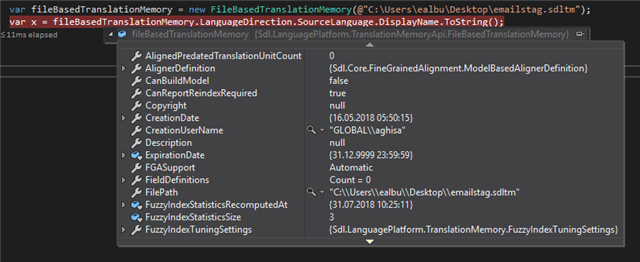 Screenshot of Trados Studio code editor showing a file-based translation memory initialization with various properties like CreationDate and FuzzyIndexTuningSettings.