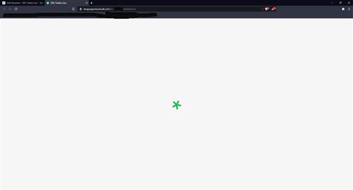 Web browser window displaying a blank page with a green cross in the center, indicating a blocked or failed attempt to access SDL Trados Live.