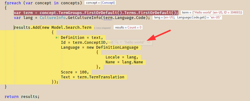 Screenshot of code in Trados Studio with a highlighted section showing the addition of a 'Definition' property to the Term class and an arrow pointing to the 'hello world' search term.